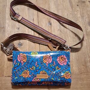 Consuela Vibrant Blue and Orange Floral Clutch